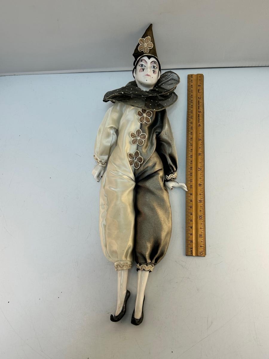 Porcelain jester best sale clown dolls