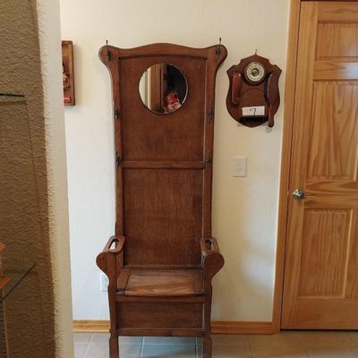 ANTIQUE HALL TREE WITH ROUND MIRROR, UMBRELLA HOLDERS AND STORAGE IN THE SEAT