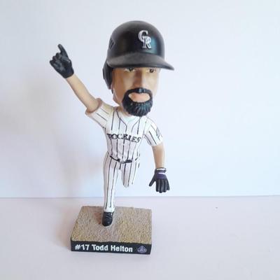 Colorado Rockies 20th Anniversary Season Bobble Head Collectible Todd Helton #9 in series of 10 with field caught ball.
