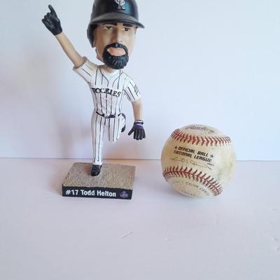 Colorado Rockies 20th Anniversary Season Bobble Head Collectible Todd Helton #9 in series of 10 with field caught ball.