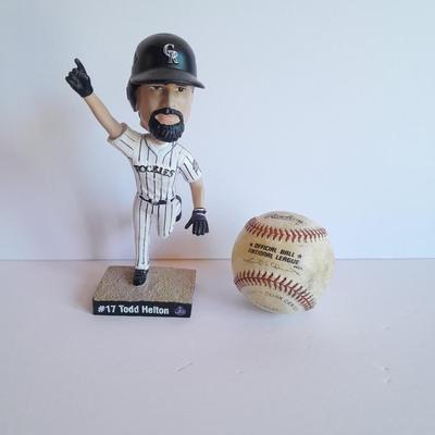 Colorado Rockies 20th Anniversary Season Bobble Head Collectible Todd Helton #9 in series of 10 with field caught ball.