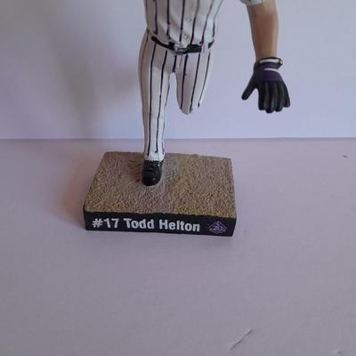 Colorado Rockies 20th Anniversary Season Bobble Head Collectible Todd Helton #9 in series of 10 with field caught ball.