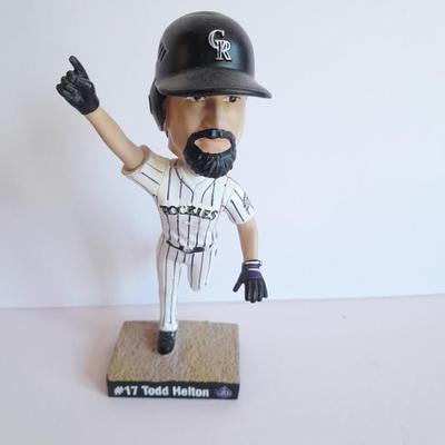 Colorado Rockies 20th Anniversary Season Bobble Head Collectible Todd Helton #9 in series of 10 with field caught ball.