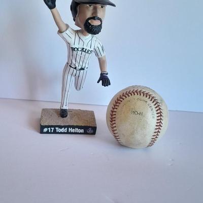 Colorado Rockies 20th Anniversary Season Bobble Head Collectible Todd Helton #9 in series of 10 with field caught ball.