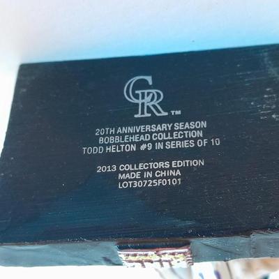 Colorado Rockies 20th Anniversary Season Bobble Head Collectible Todd Helton #9 in series of 10 with field caught ball.