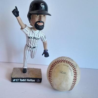 Colorado Rockies 20th Anniversary Season Bobble Head Collectible Todd Helton #9 in series of 10 with field caught ball.
