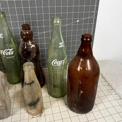 Bottles: Mrs. Butterworth, Coke, Beer other DUMP MINE BOTTLE
