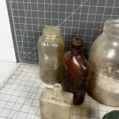 Bottles: Mrs. Butterworth, Coke, Beer other DUMP MINE BOTTLE