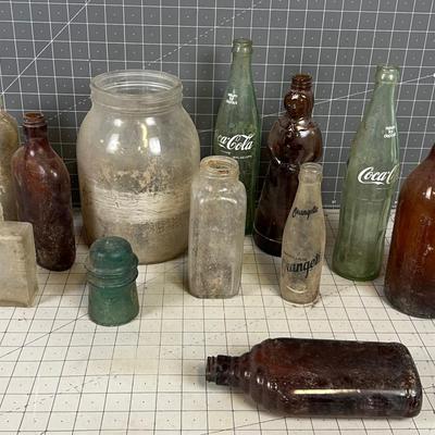 Bottles: Mrs. Butterworth, Coke, Beer other DUMP MINE BOTTLE