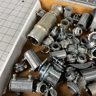Tray of Electrical Conduit Parts