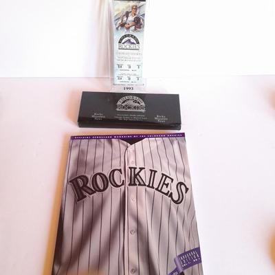 Rockies Memorabilia 1993 April 9, 1993, cased ticket with box and a Rockies Inaugural edition Volume 1 edition 1 scorecard magazine