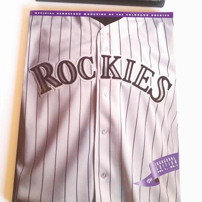 Rockies Memorabilia 1993 April 9, 1993, cased ticket with box and a Rockies Inaugural edition Volume 1 edition 1 scorecard magazine