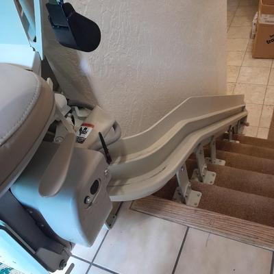 Bruno Independent Living Aids, INC. mechanical Elite Curve stair lift chair with 2 remote controls in WONDERFUL working condition