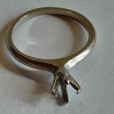 Orange Blossom Signed 18 Kt. Gold band ring missing gemstone.