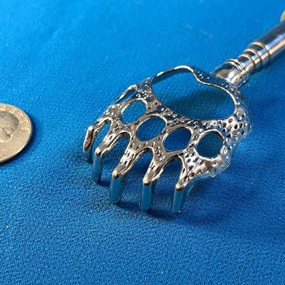 TELESCOPING â€œBEAR CLAWâ€ BACK SCRATCHER 