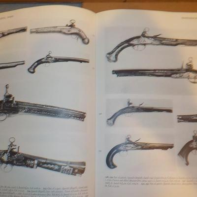 2- Great Hard Cover books of Pistols and rifles of the world./ est $30 to $50.