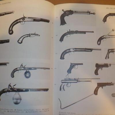 2- Great Hard Cover books of Pistols and rifles of the world./ est $30 to $50.