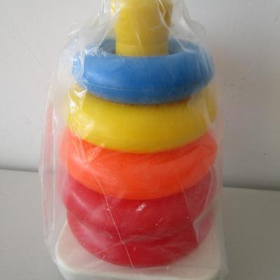 #12 Toddler play tools and Fisher Price stacking toy