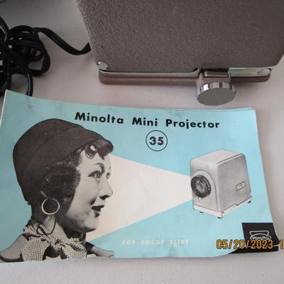#13 Vintage Minolta Mini Projector