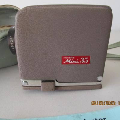 #13 Vintage Minolta Mini Projector