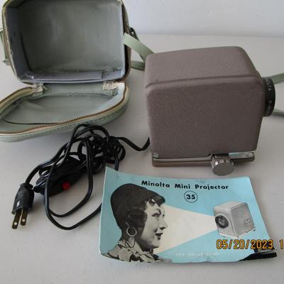 #13 Vintage Minolta Mini Projector