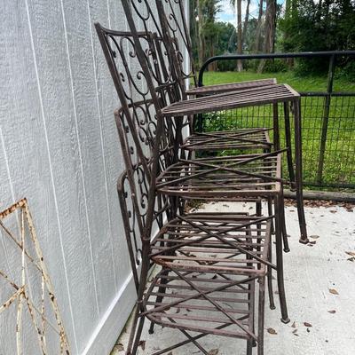 8 cast iron chairs