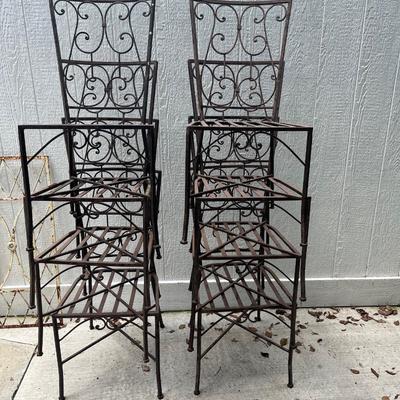 8 cast iron chairs