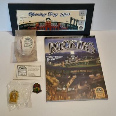 Rockies 1995 Coors Field ball, Rockies opening day scorecard magazine, collectors' pins and large matted ticket.