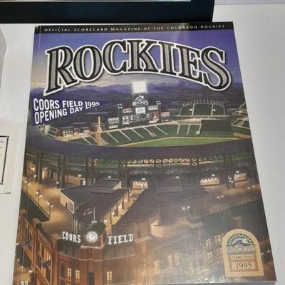 Rockies 1995 Coors Field ball, Rockies opening day scorecard magazine, collectors' pins and large matted ticket.
