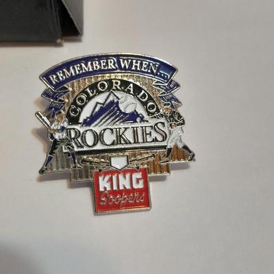 Colorado Rockies cased ticket stub, collectible pins and 1993 Inaugural Year black ball