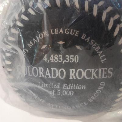 Colorado Rockies cased ticket stub, collectible pins and 1993 Inaugural Year black ball
