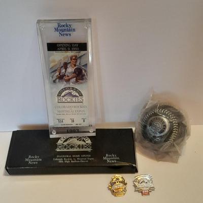 Colorado Rockies cased ticket stub, collectible pins and 1993 Inaugural Year black ball