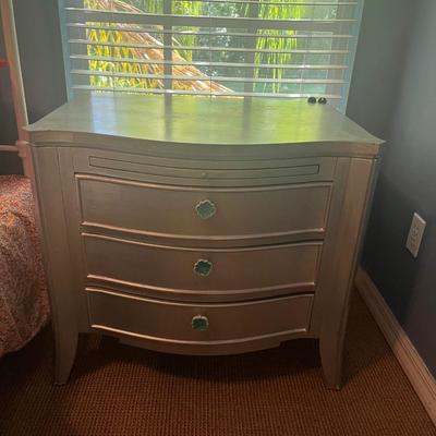 Silver in color wood night stand