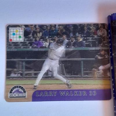 Colorado Rockies Larry Walker holographic card, 1994 opening day and final day matted art, and scorecard magazine