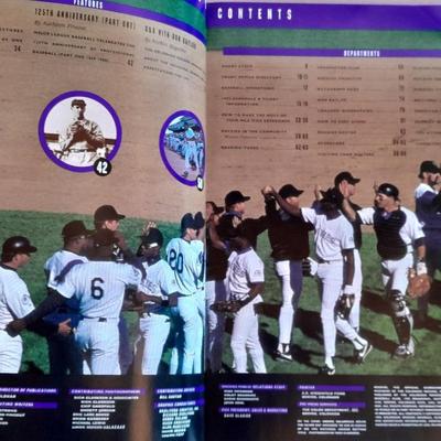 Colorado Rockies Larry Walker holographic card, 1994 opening day and final day matted art, and scorecard magazine