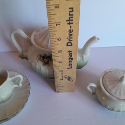 Katherine's Collection Porcelain Teacup Set Whir/Green W/Purple Flowers