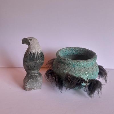 Signed stone Eagle statue with Zuni fetish pot cased in turquoise chips with feather accents.