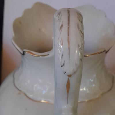 Large gold rimmed semiâ€“Vitreous Porcelain K.T. &M. pitcher on Dansk Platter