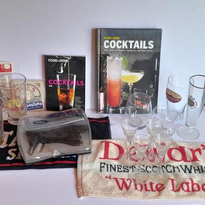 Barware, Rabbit corkscrew, assortment of drinking glasses, Cocktail recipe books, bar rags, Lee's bar coasters