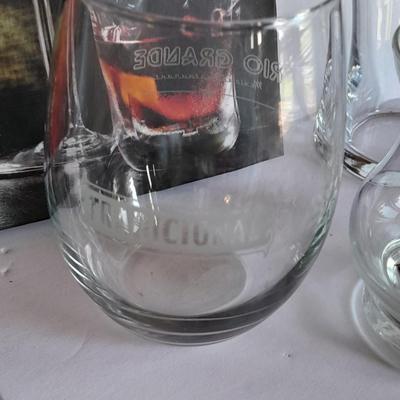 Barware, Rabbit corkscrew, assortment of drinking glasses, Cocktail recipe books, bar rags, Lee's bar coasters