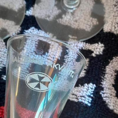 Barware, Rabbit corkscrew, assortment of drinking glasses, Cocktail recipe books, bar rags, Lee's bar coasters
