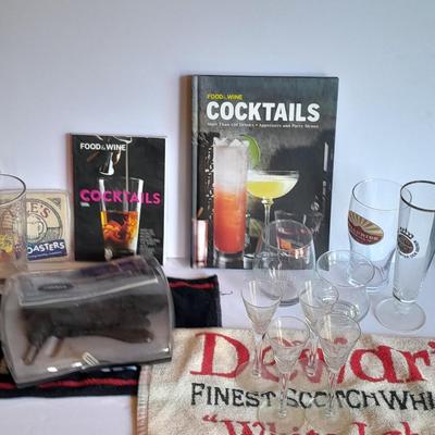 Barware, Rabbit corkscrew, assortment of drinking glasses, Cocktail recipe books, bar rags, Lee's bar coasters