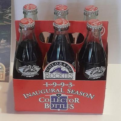 Colorado Rockies Memorabilia Larry Walker # 33 holographic card, coke collector's bottles, Baseball cap, scorecard magazine and more