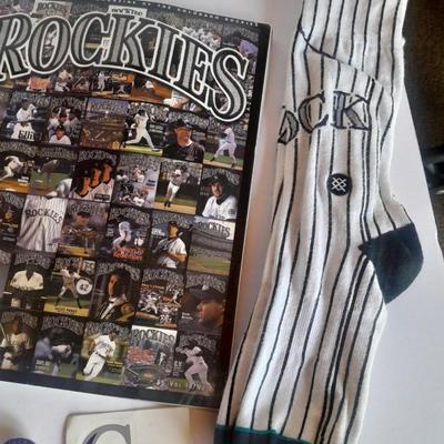 Colorado Rockies scorecard magazines, cap, socks, pin, sticker, metal plate and more