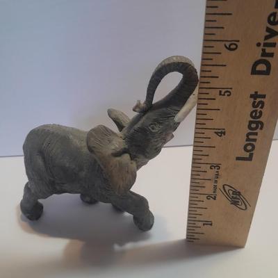 Collection of collectible Elephants with set of four black and white placemats