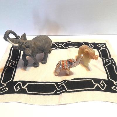 Collection of collectible Elephants with set of four black and white placemats