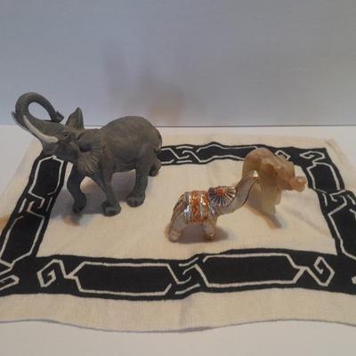 Collection of collectible Elephants with set of four black and white placemats