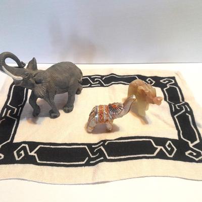 Collection of collectible Elephants with set of four black and white placemats