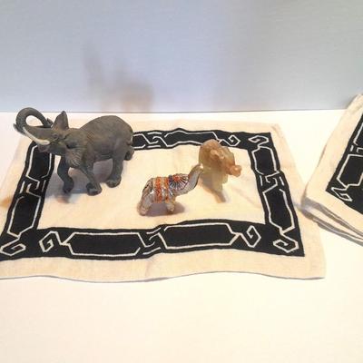 Collection of collectible Elephants with set of four black and white placemats
