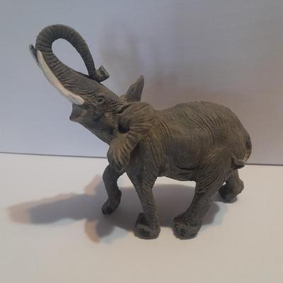 Collection of collectible Elephants with set of four black and white placemats